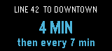 Center slot showing a transit countdown in blue
